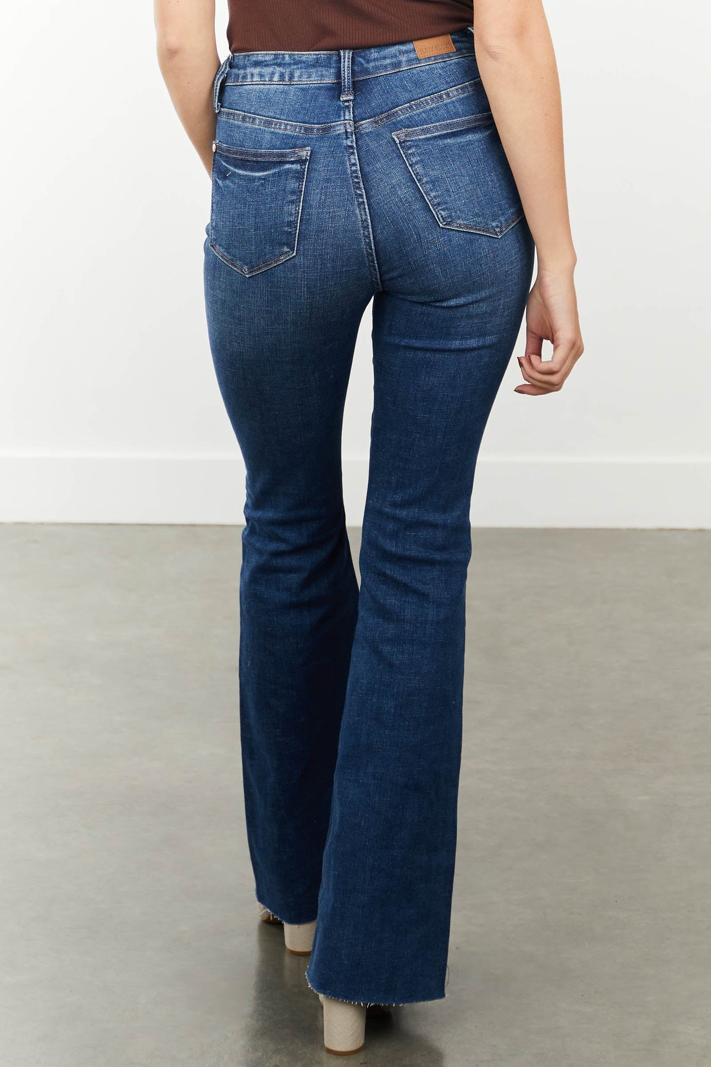 Medium High Rise Raw Hem Stretchy Flare Jeans