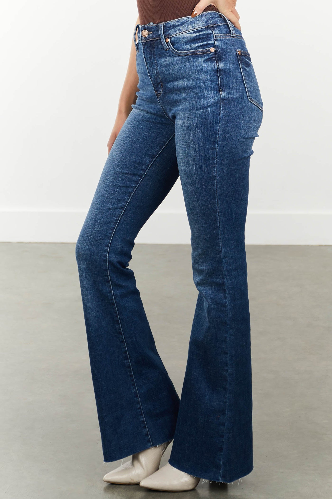 Medium High Rise Raw Hem Stretchy Flare Jeans