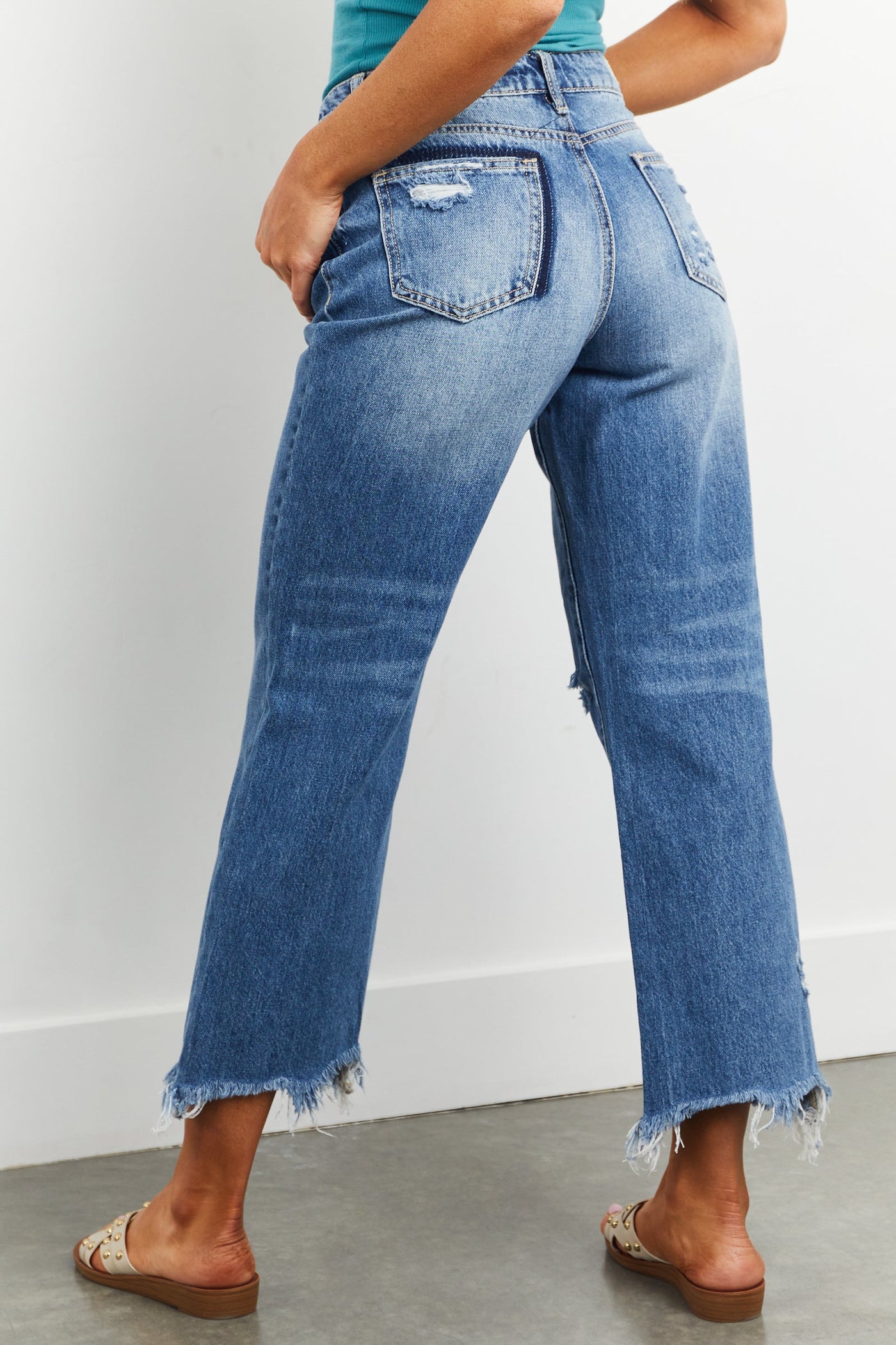 Medium Wash High Rise Frayed Hem Mom Jeans
