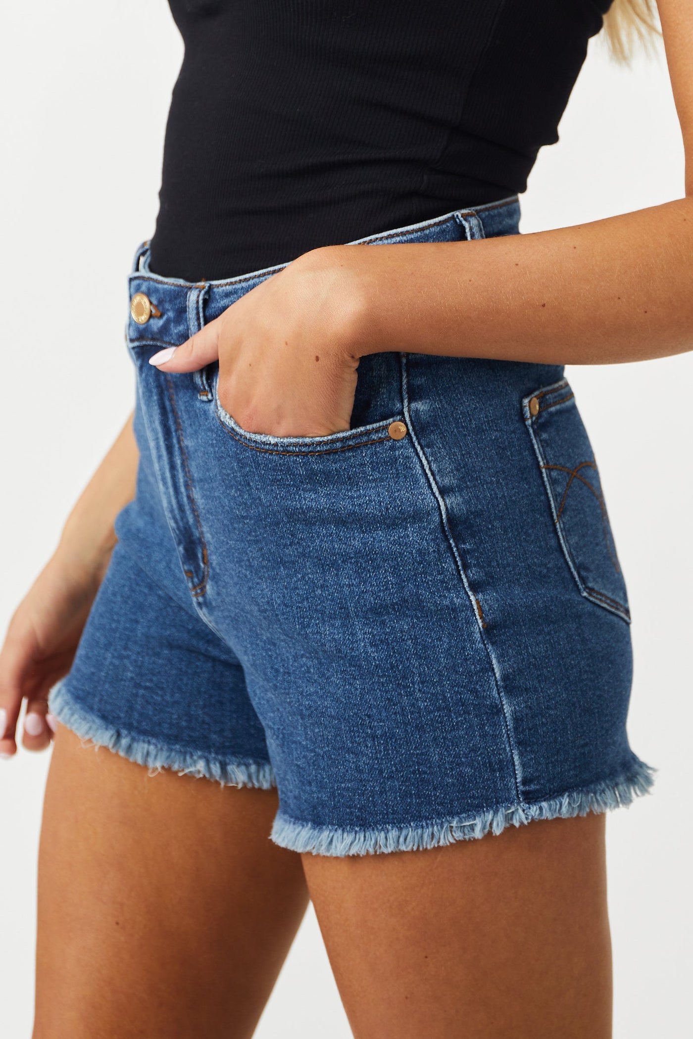 Medium Wash High Rise Frayed Hem Stretchy Shorts