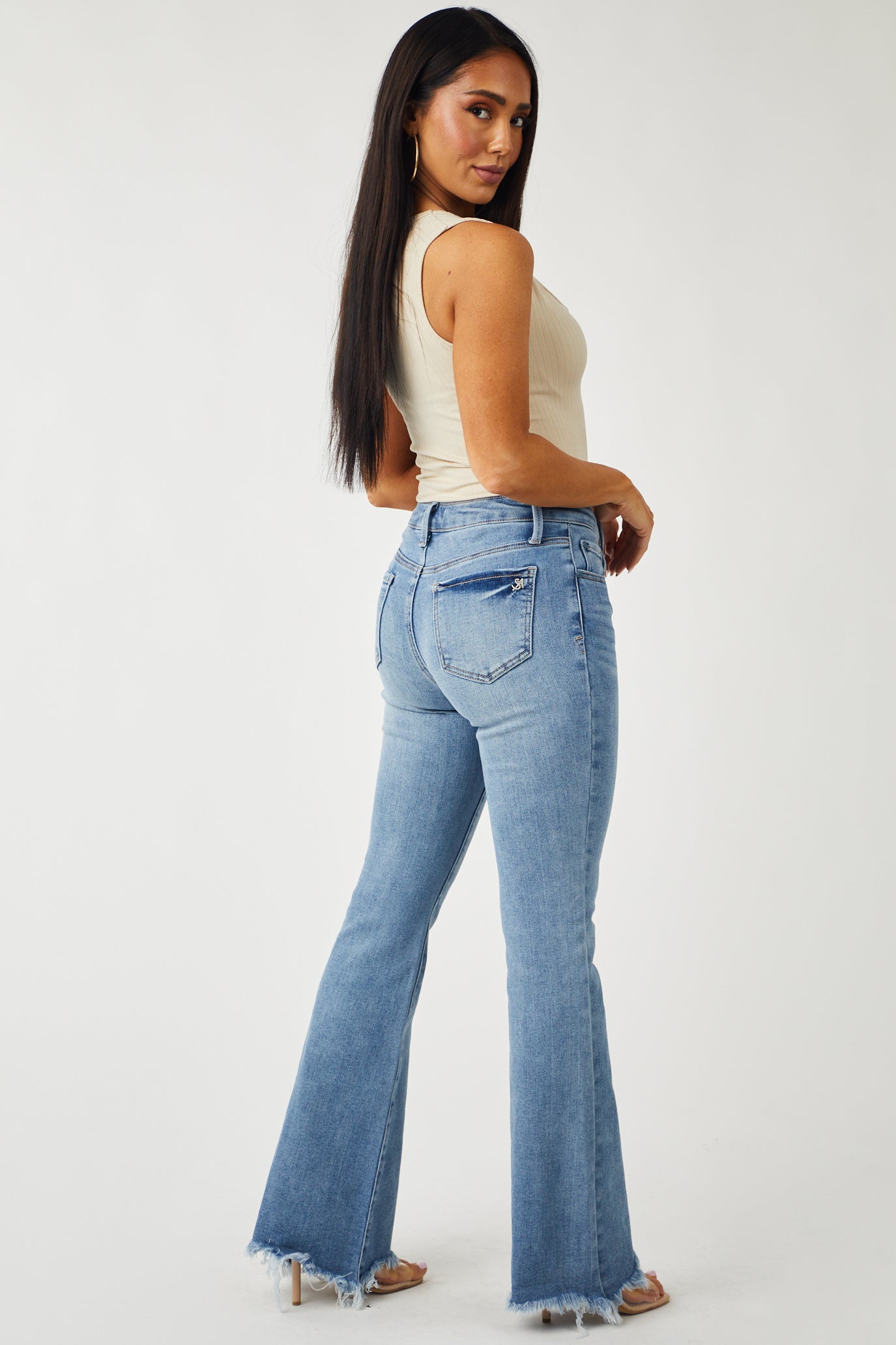 Medium Wash High Rise Raw Hem Bootleg Jeans