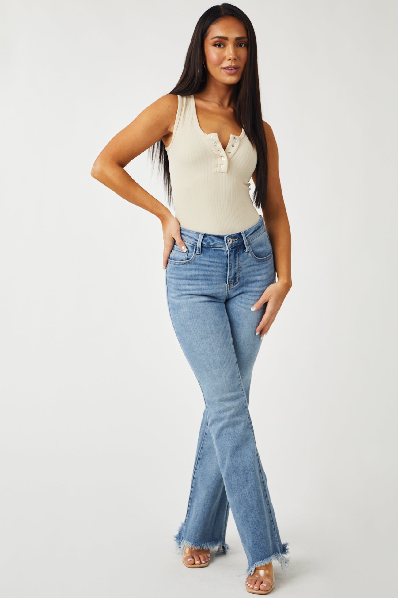 Medium Wash High Rise Raw Hem Bootleg Jeans