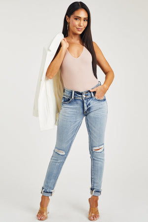 Medium Wash Mid Rise Distressed Knee Skinny Jeans