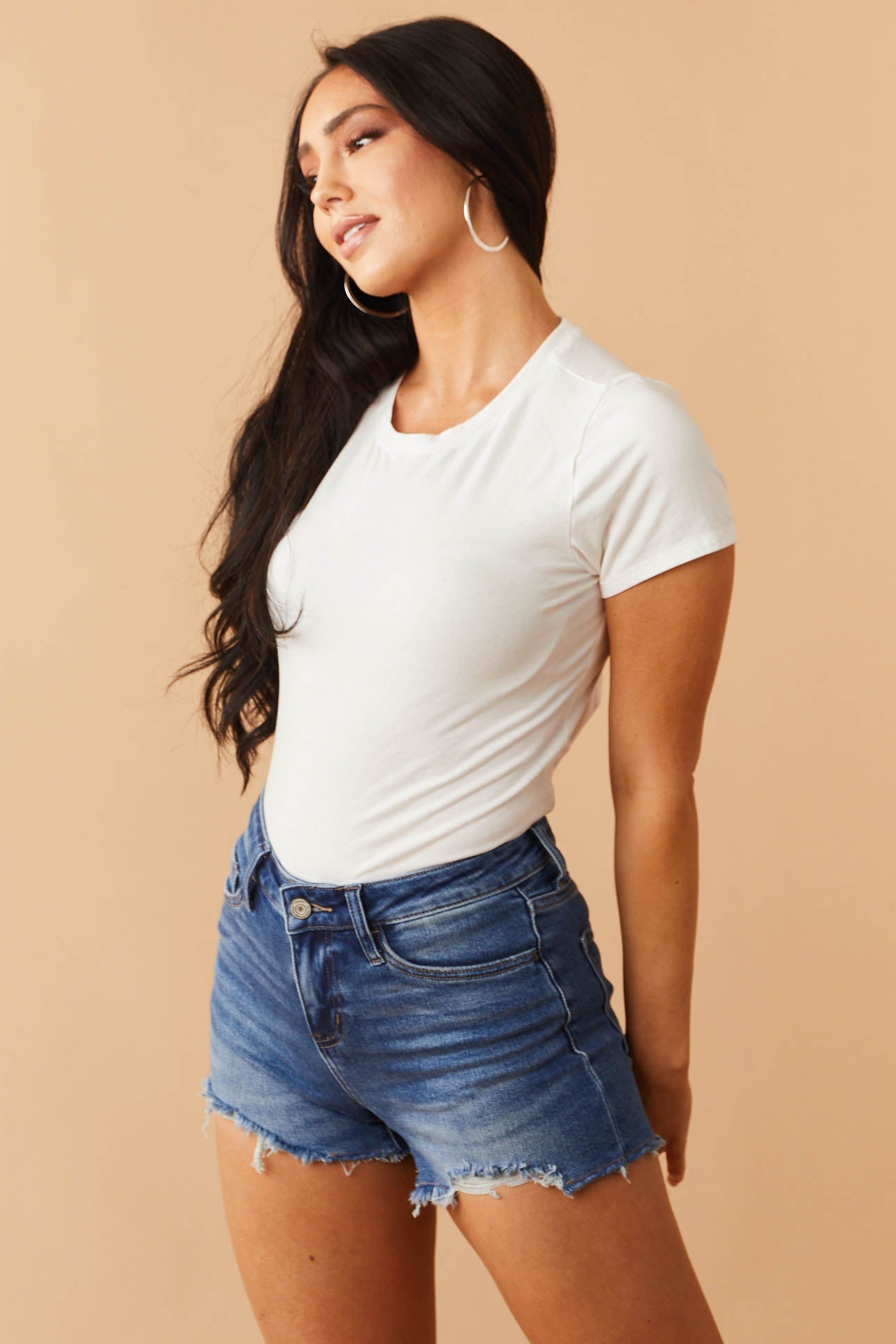 Medium Wash Mid Rise Lightly Distressed Shorts