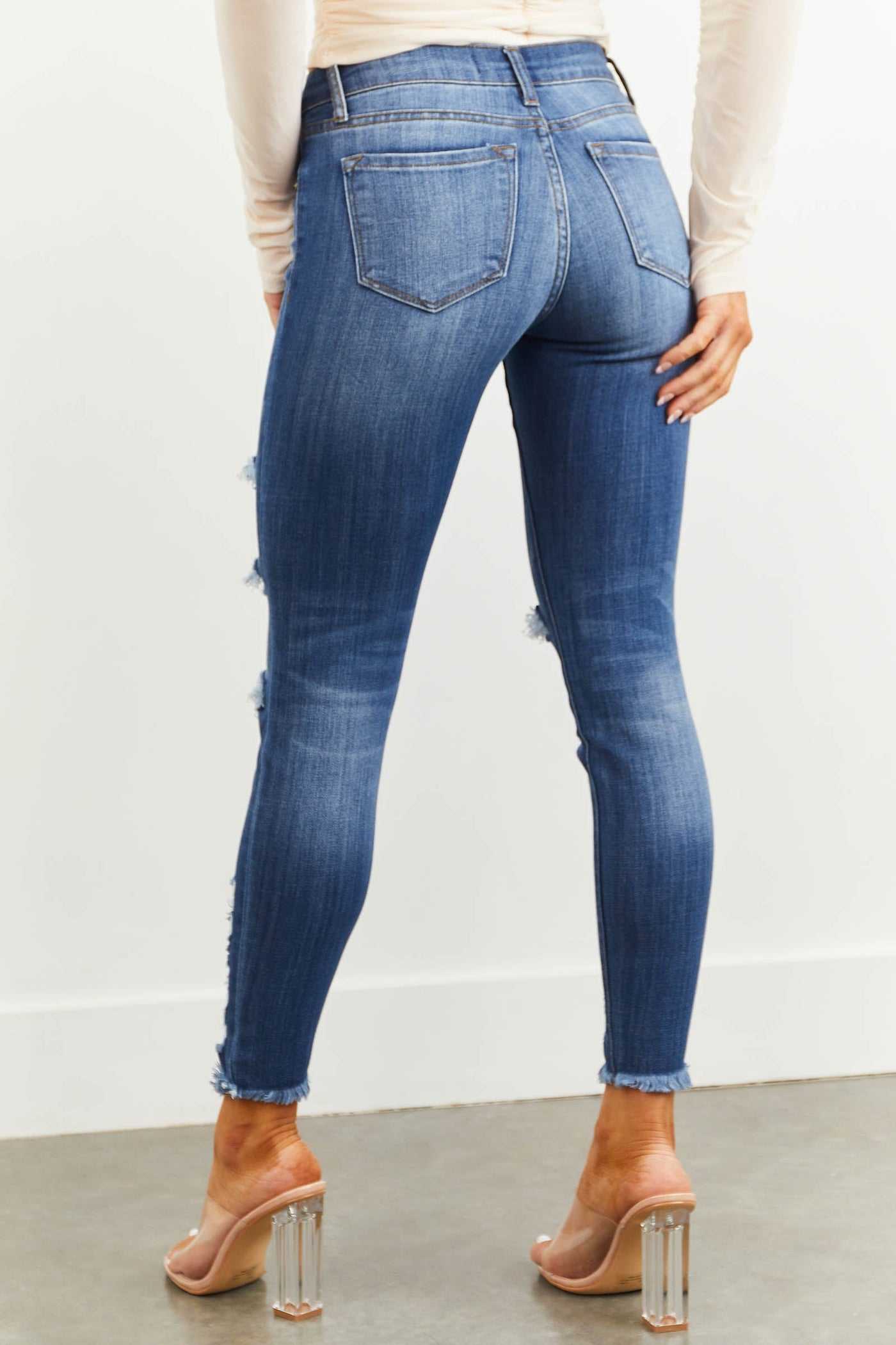 Medium Wash Mid Rise Skinny Distressed Jeans with Frayed Hem