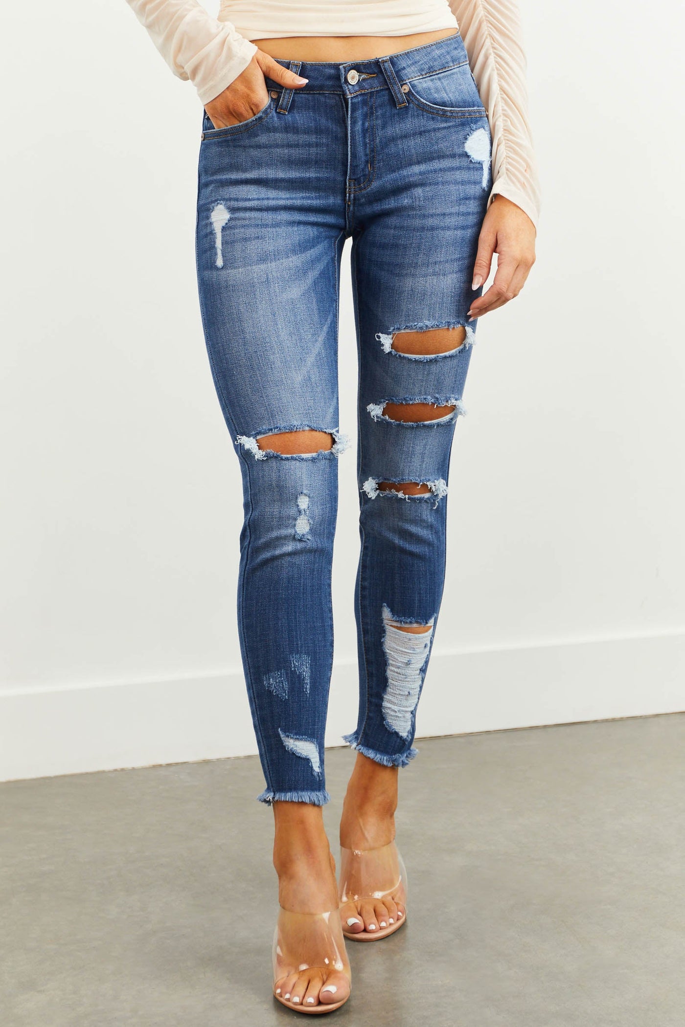 Medium Wash Mid Rise Skinny Distressed Jeans with Frayed Hem