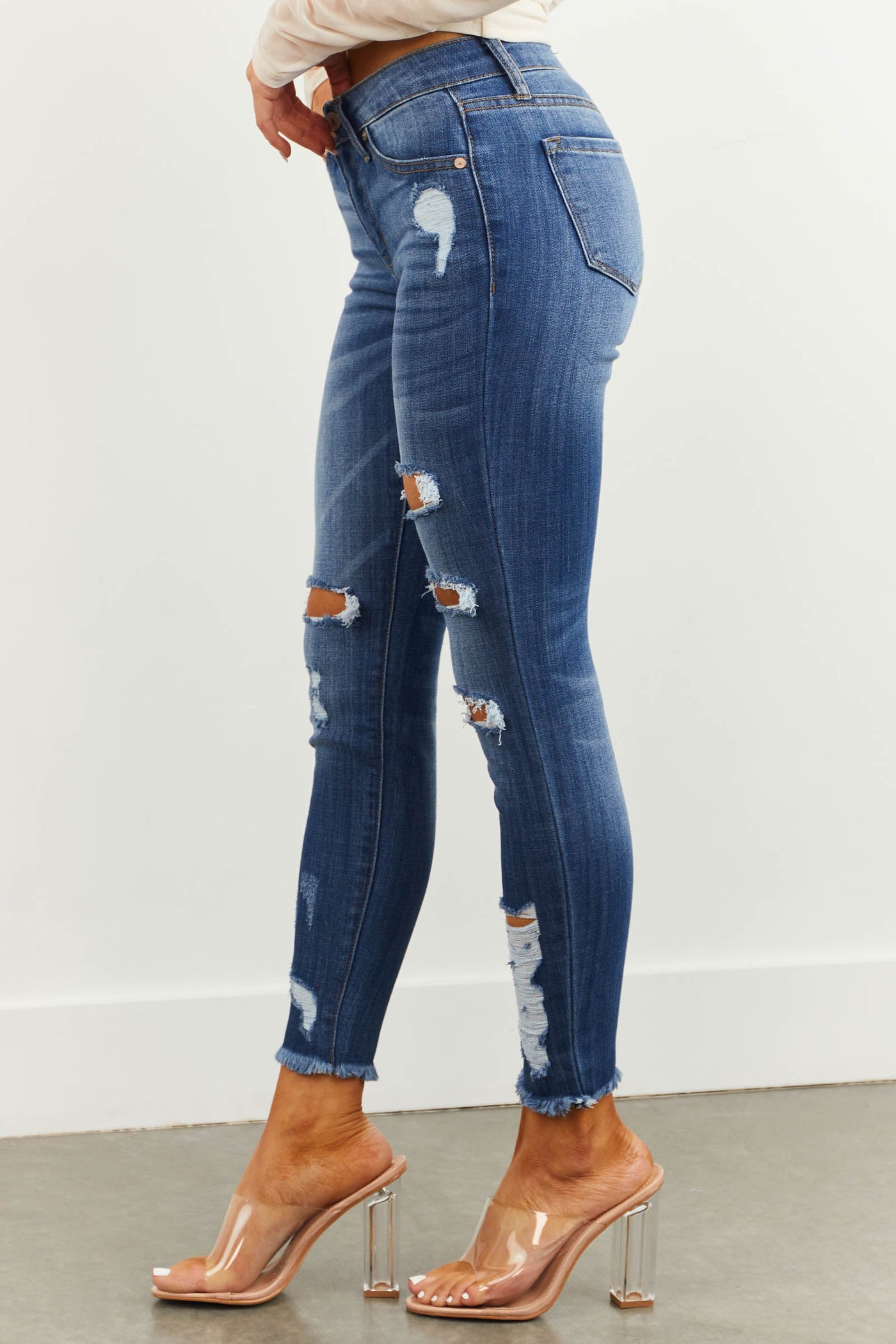 Medium Wash Mid Rise Skinny Distressed Jeans with Frayed Hem