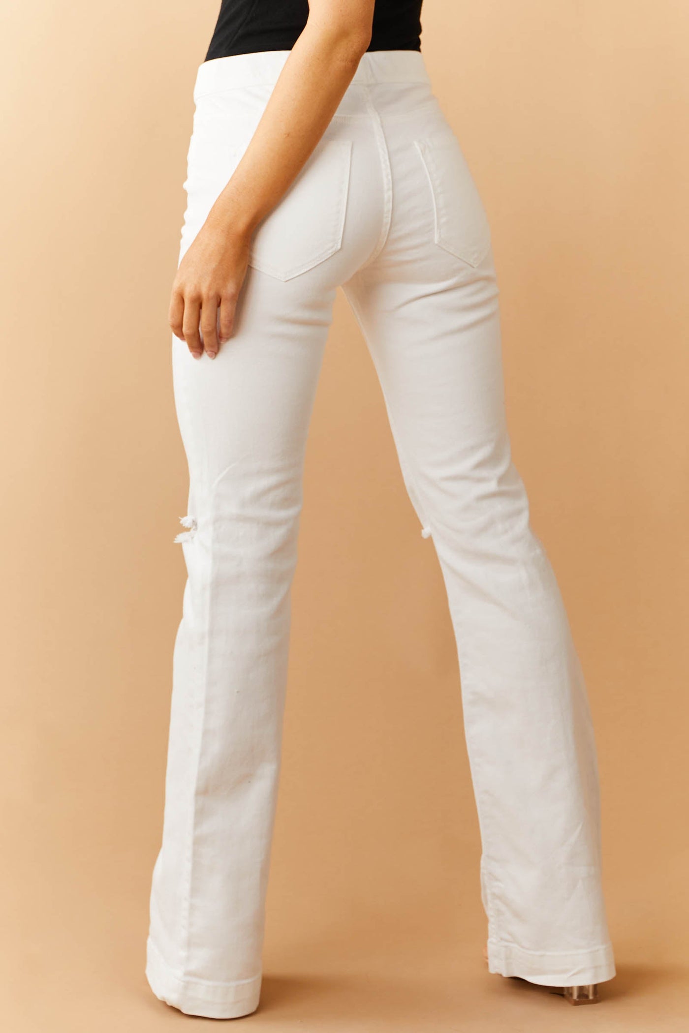 Off White Mid Rise Distressed Knee Jeggings