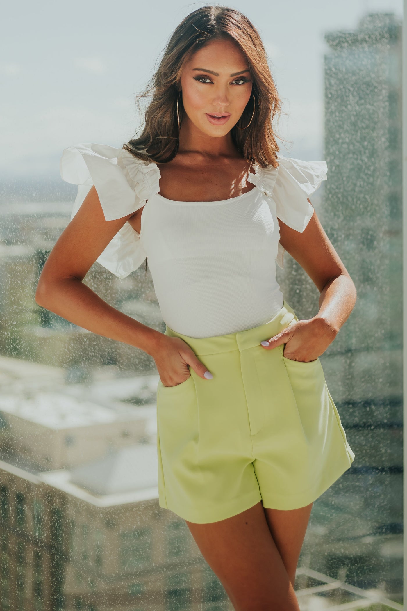 Off White Ribbed Knit Ruffle Sleeve Bodysuit