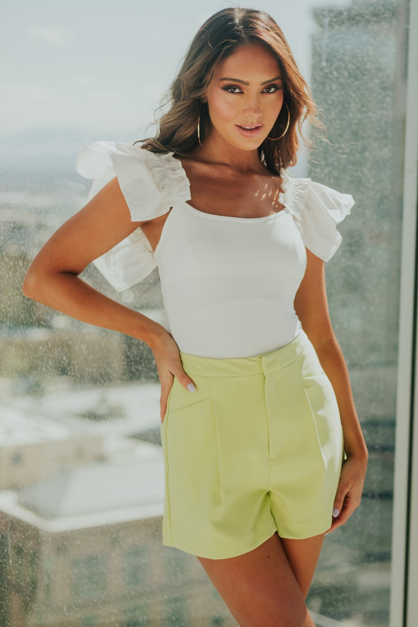 Off White Ribbed Knit Ruffle Sleeve Bodysuit