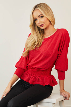 Ruby Long Sleeve Smocked Peplum Knit Top