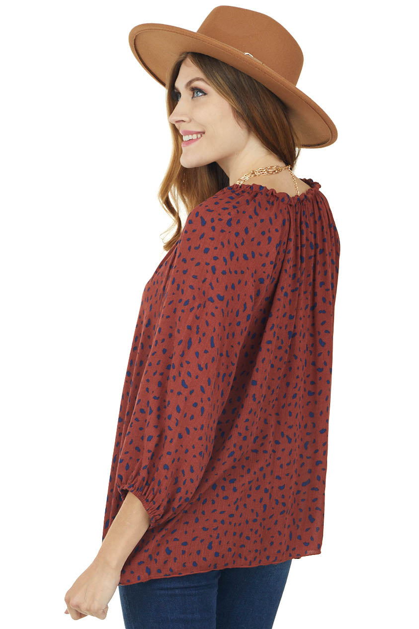 Rust Animal Print Bubble Sleeve Blouse