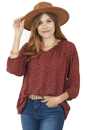 Rust Animal Print Bubble Sleeve Blouse