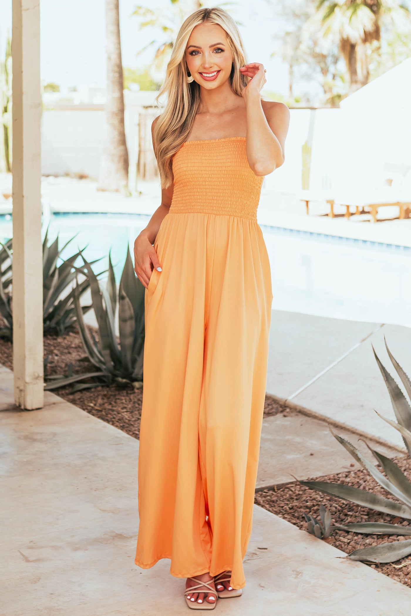 Tangerine Smocked Strapless Wide Leg Knit Jumpsuit