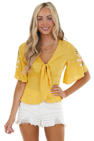 Amber Woven Front Tie Top with Floral Embroidered Details