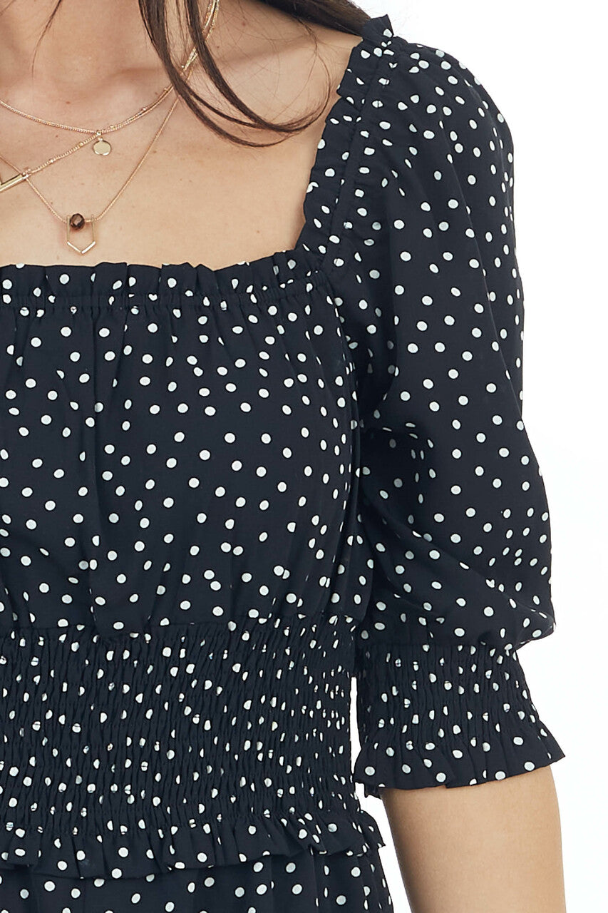 Black and White Polka Dot Smocked Romper with Ruffles Detail