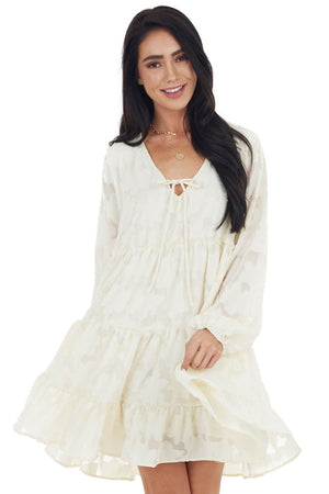 Cream Textured Print Tiered Babydoll Dress with Long Sleeves