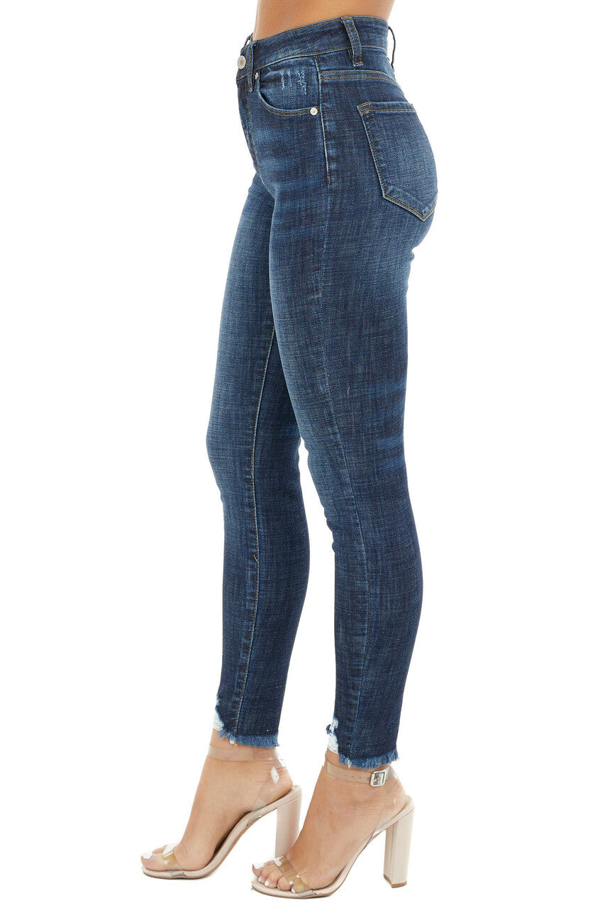 Dark Wash High Rise Skinny Jeans with Distressed Hemline