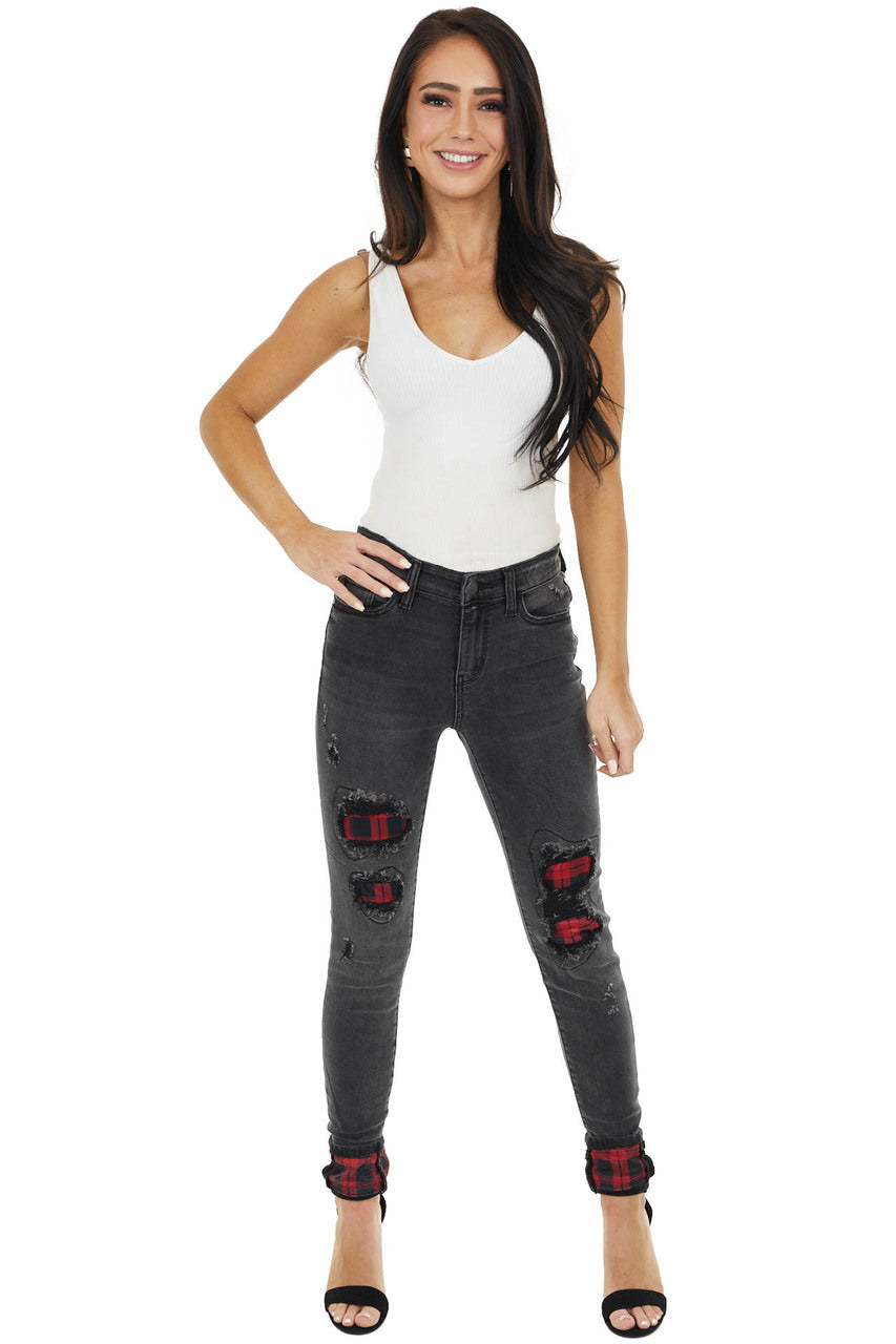 Faded Black Mid Rise Jeans with Plaid Patches and Cuffs