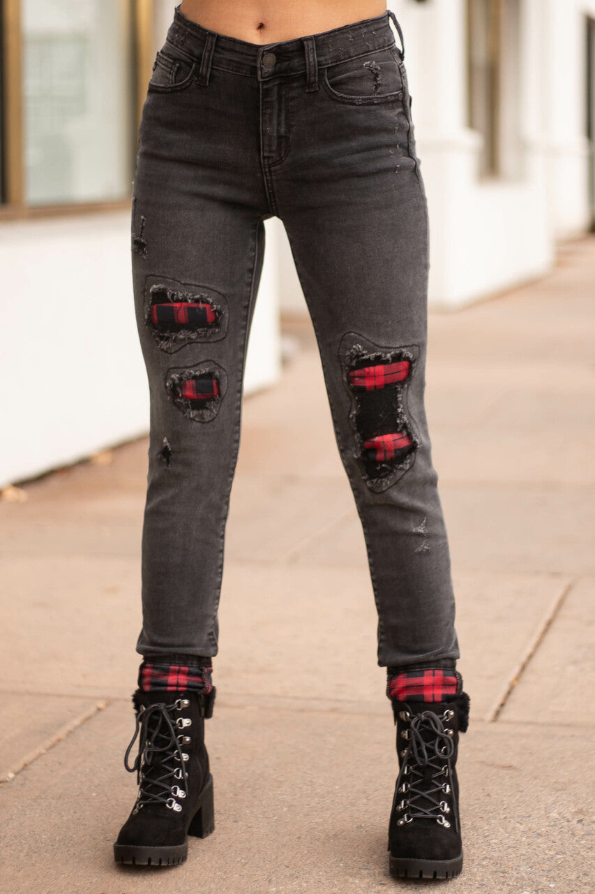 Faded Black Mid Rise Jeans with Plaid Patches and Cuffs