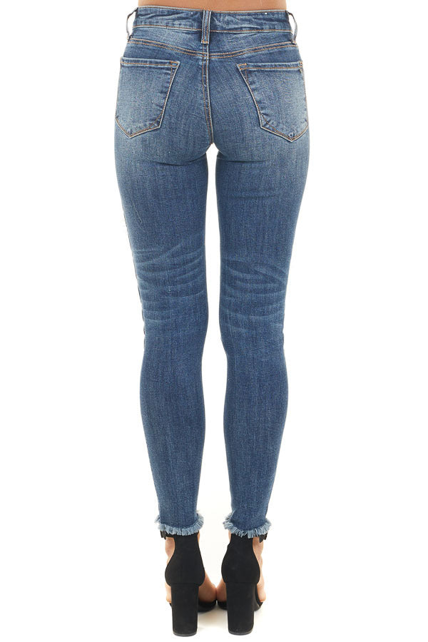 Dark Wash Denim Skinny Jeans with Distressed Leopard Print