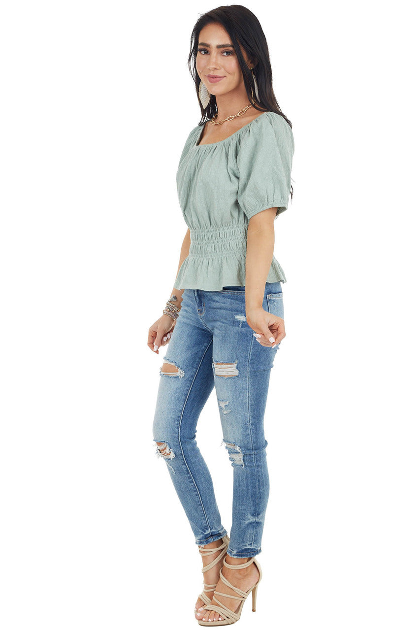 Rich Sage Short Sleeve Peplum Knit Top with Smocked Waist