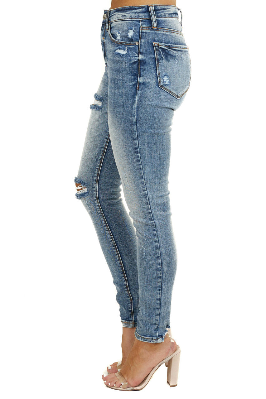 Faded Medium Wash High Rise Distressed Skinny Jeans