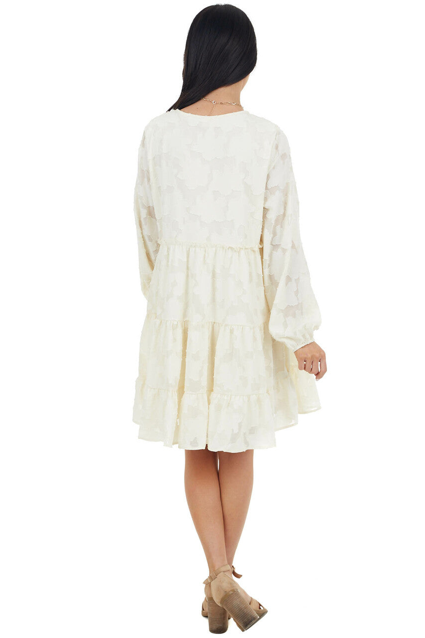 Cream Textured Print Tiered Babydoll Dress with Long Sleeves