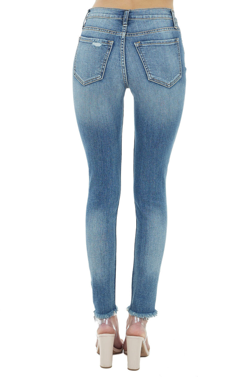 Medium Wash Mid Rise Jeans with Frayed Hem and Distressing