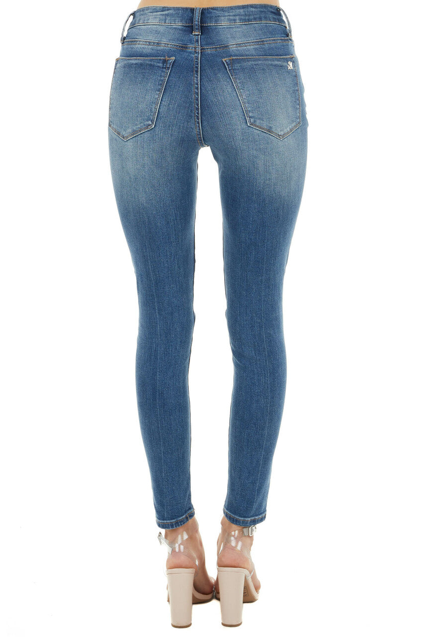 Medium Dark Wash Mid Rise Distressed Skinny Jeans