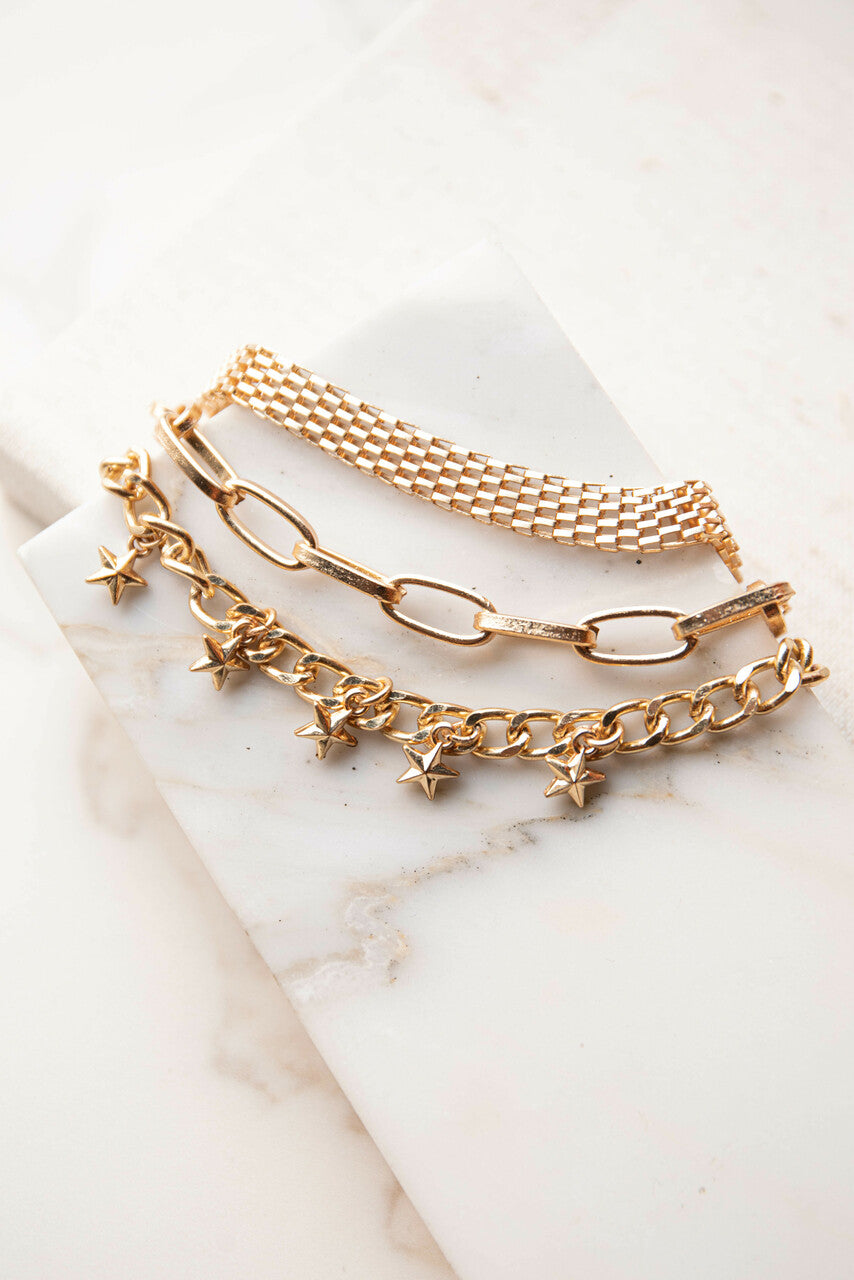 Gold Multi Chain Bracelet with Star Charms