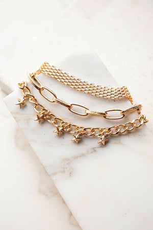 Gold Multi Chain Bracelet with Star Charms