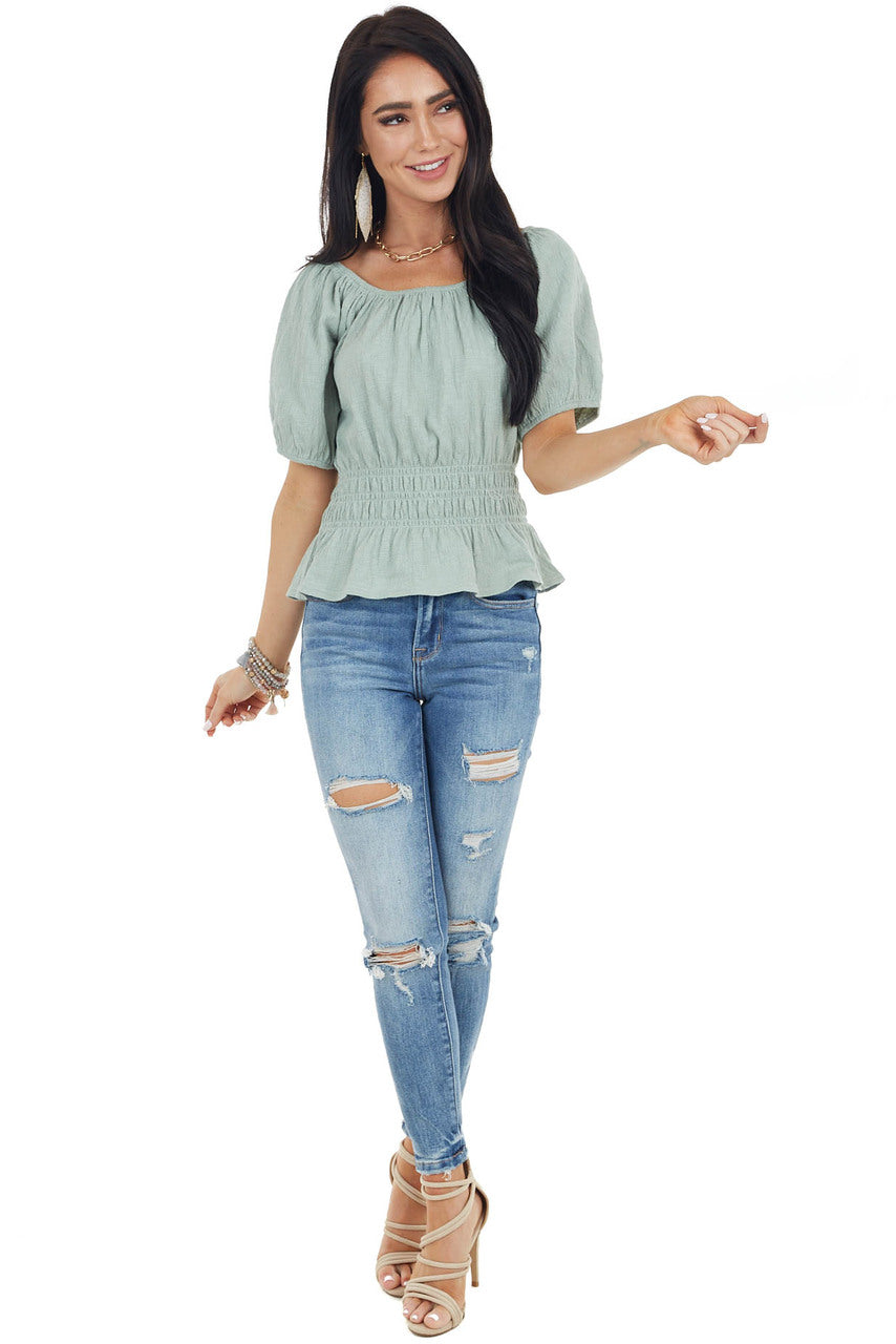 Rich Sage Short Sleeve Peplum Knit Top with Smocked Waist
