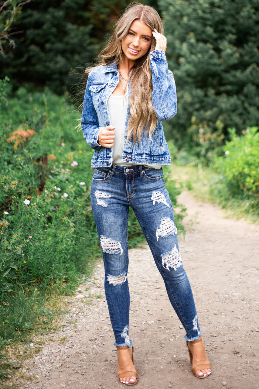 Dark Wash Denim Skinny Jeans with Distressed Leopard Print