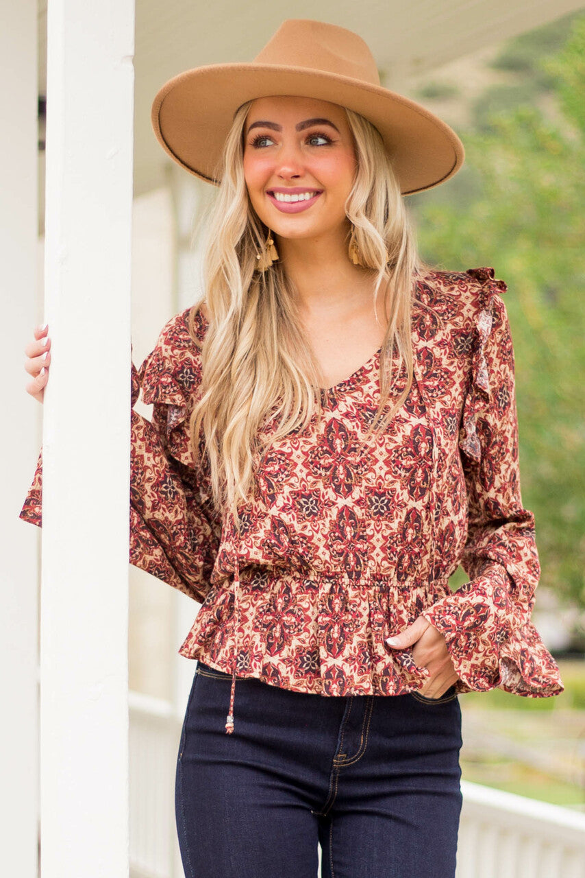 Cranberry Abstract Peplum Long Sleeve Top