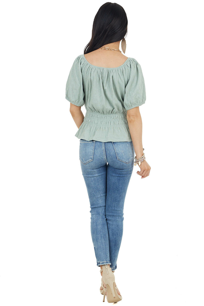 Rich Sage Short Sleeve Peplum Knit Top with Smocked Waist
