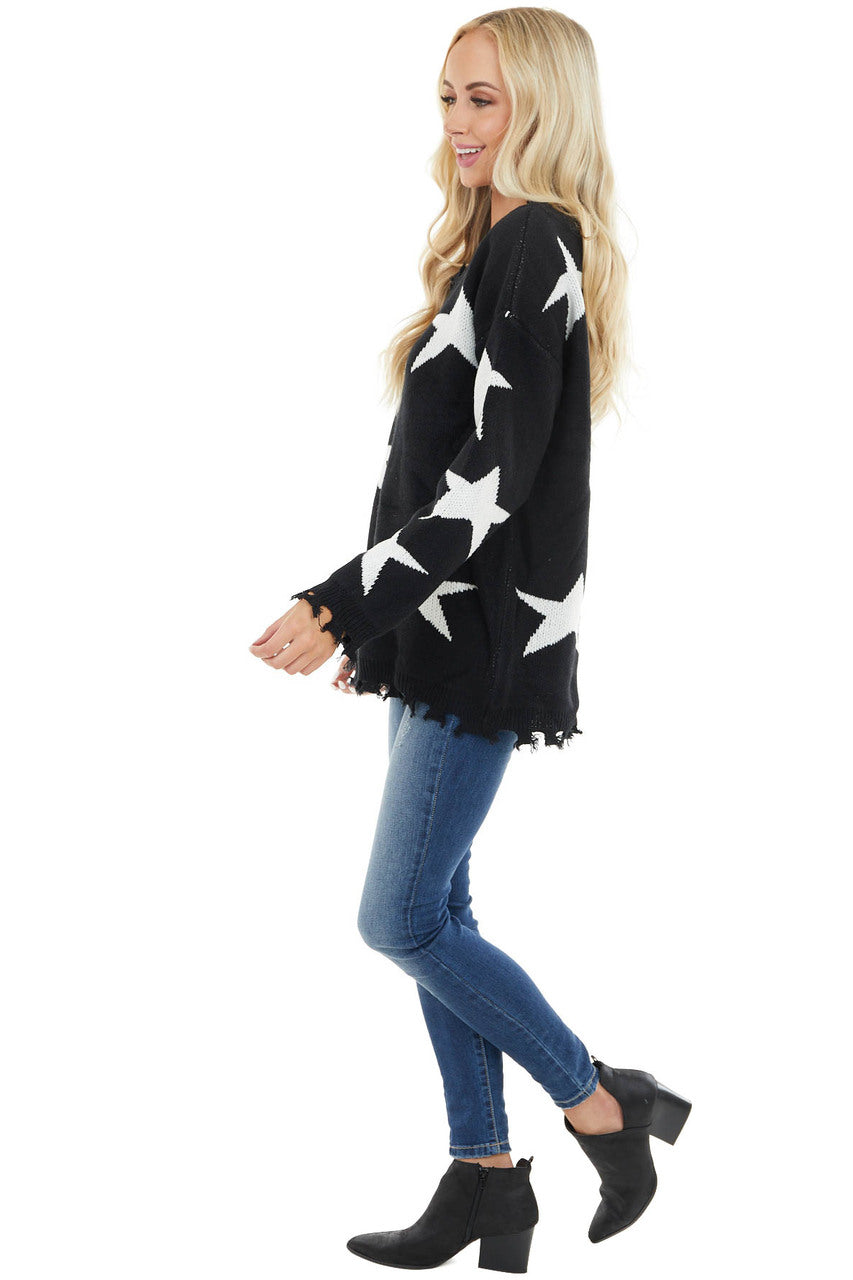 Black and Ivory Star Print Sweater Top with Fringe Detail
