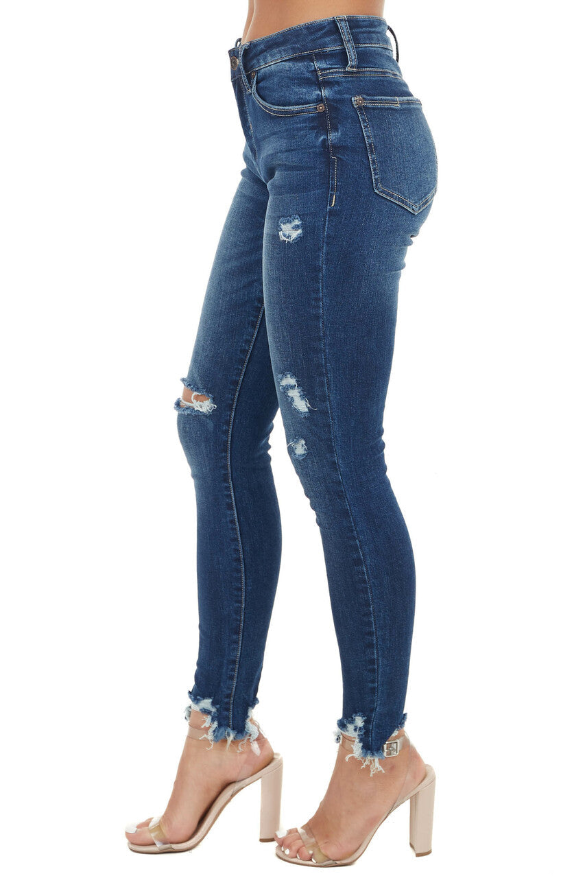 Medium Wash Mid Rise Skinny Jean with Distressed Details