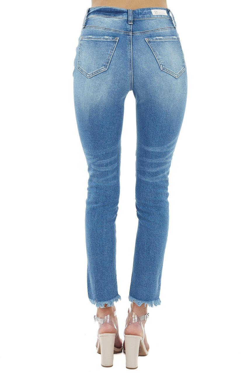 Medium Wash High Rise Skinny Jeans with Distressed Hem