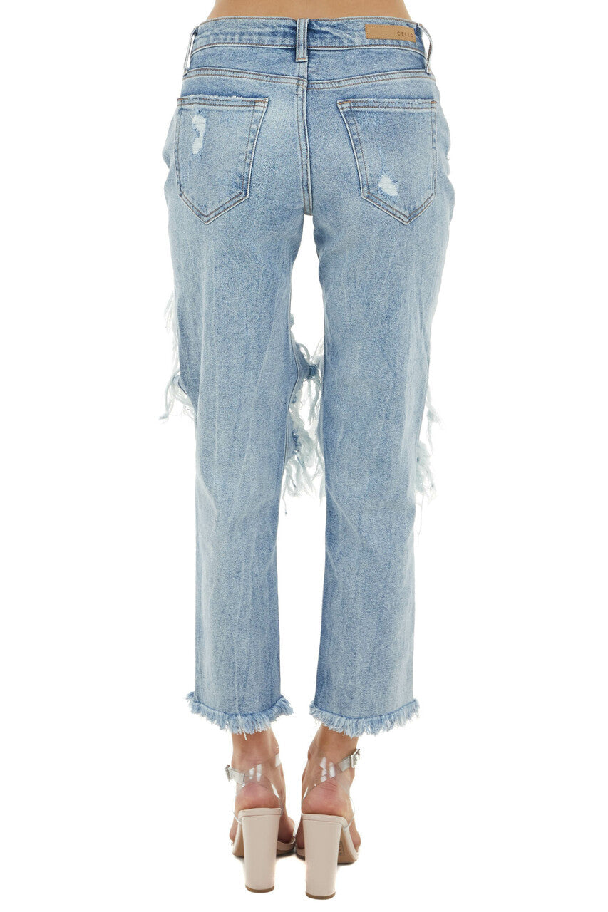 Medium Wash Mid Rise Distressed Jeans with Frayed Detail 
