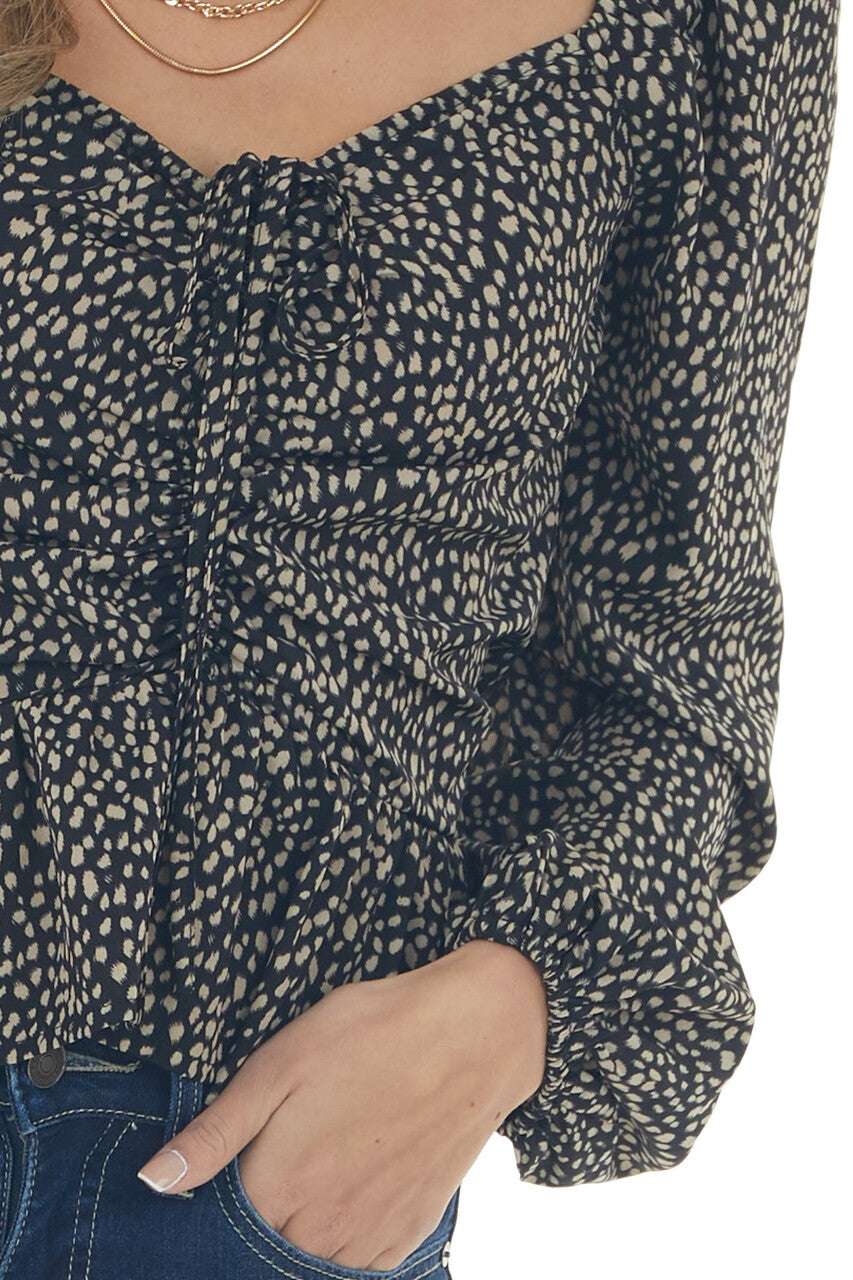 Black Animal Print Ruching Front Peplum Blouse