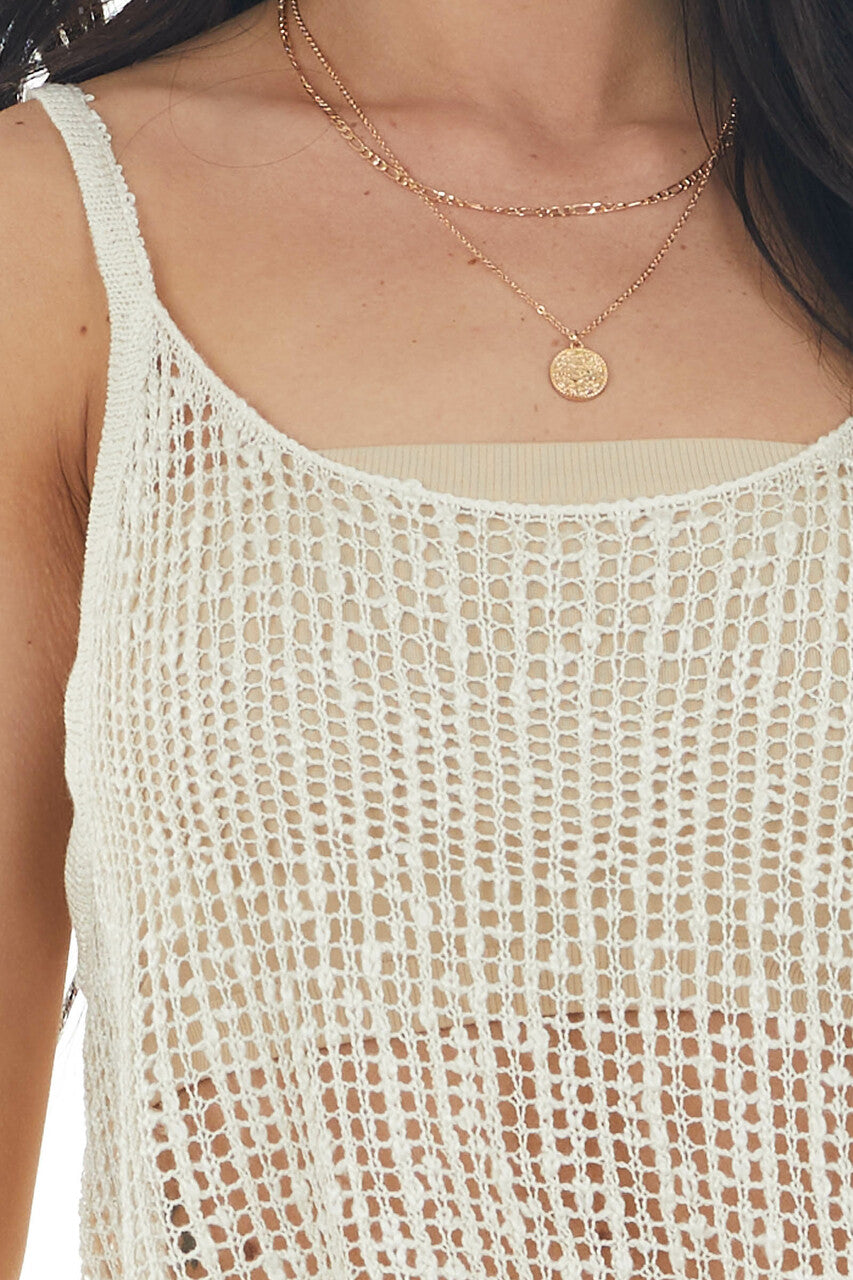 Ivory Sleeveless Sheer Knit Top with Asymmetrical Hemline