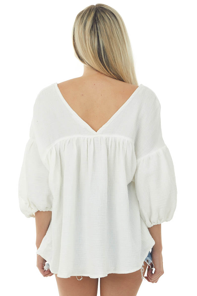 Ivory Textured V Neck Babydoll Top