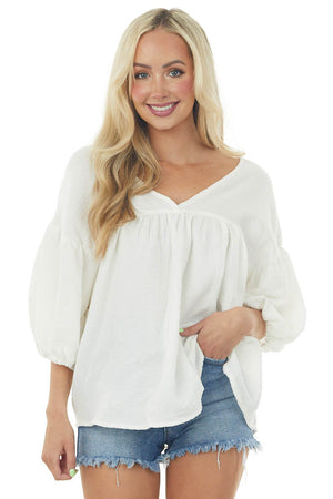 Ivory Textured V Neck Babydoll Top