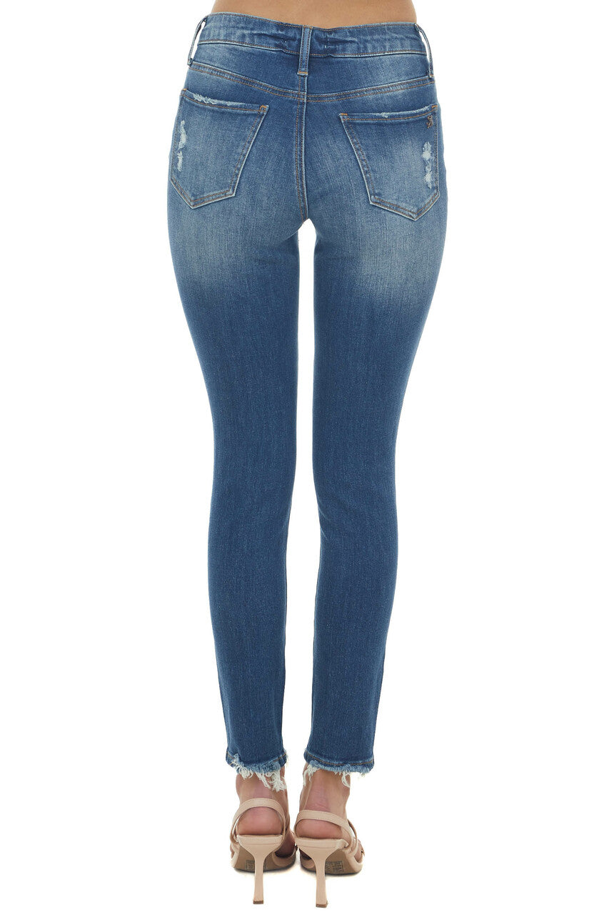 Medium Dark Wash Distressed Mid Rise Jeans