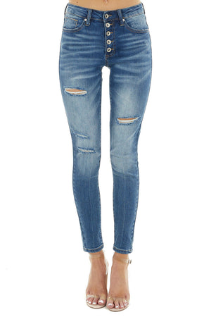 Medium Dark Wash Mid Rise Distressed Skinny Jeans