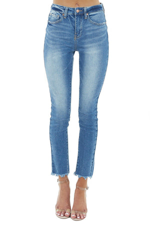 Medium Wash High Rise Skinny Jeans with Distressed Hem