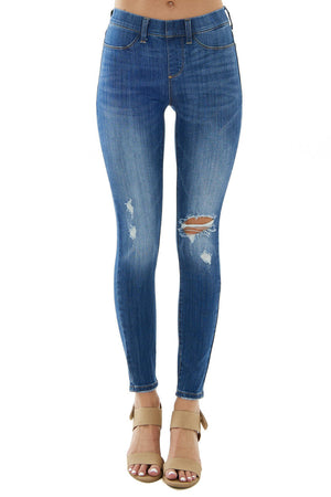 Medium Wash Mid Rise Distressed Knee Jeggings