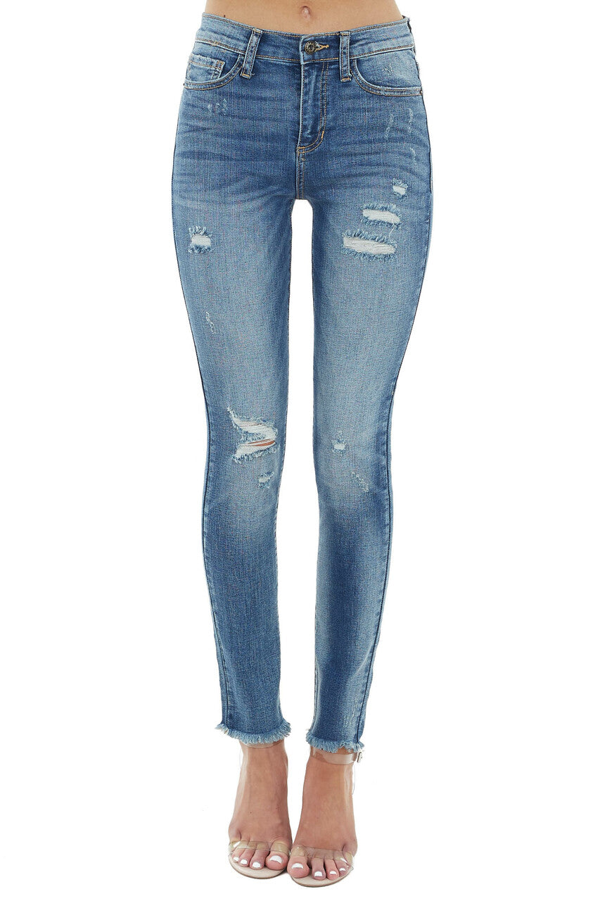 Medium Wash Mid Rise Jeans with Frayed Hem and Distressing