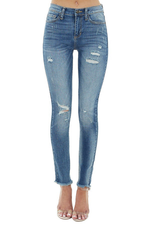 Medium Wash Mid Rise Jeans with Frayed Hem and Distressing